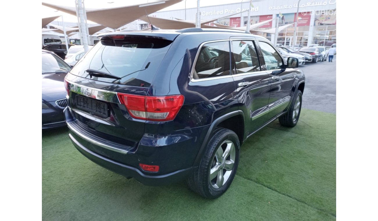 Jeep Grand Cherokee Model 2013, Gulf, blue color, inside saffron, leather hatch, installed in excellent condition, you d