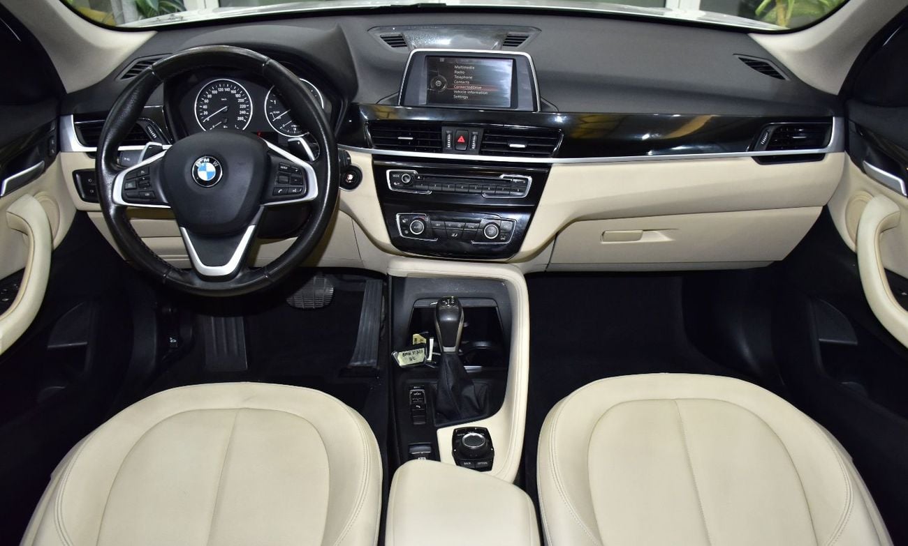 BMW X1 SDRIVE 20i EXCLUSIVE EXCELLENT DEAL for our BMW X1 sDrive20i ( 2017 Model ) in White Color GCC Specs