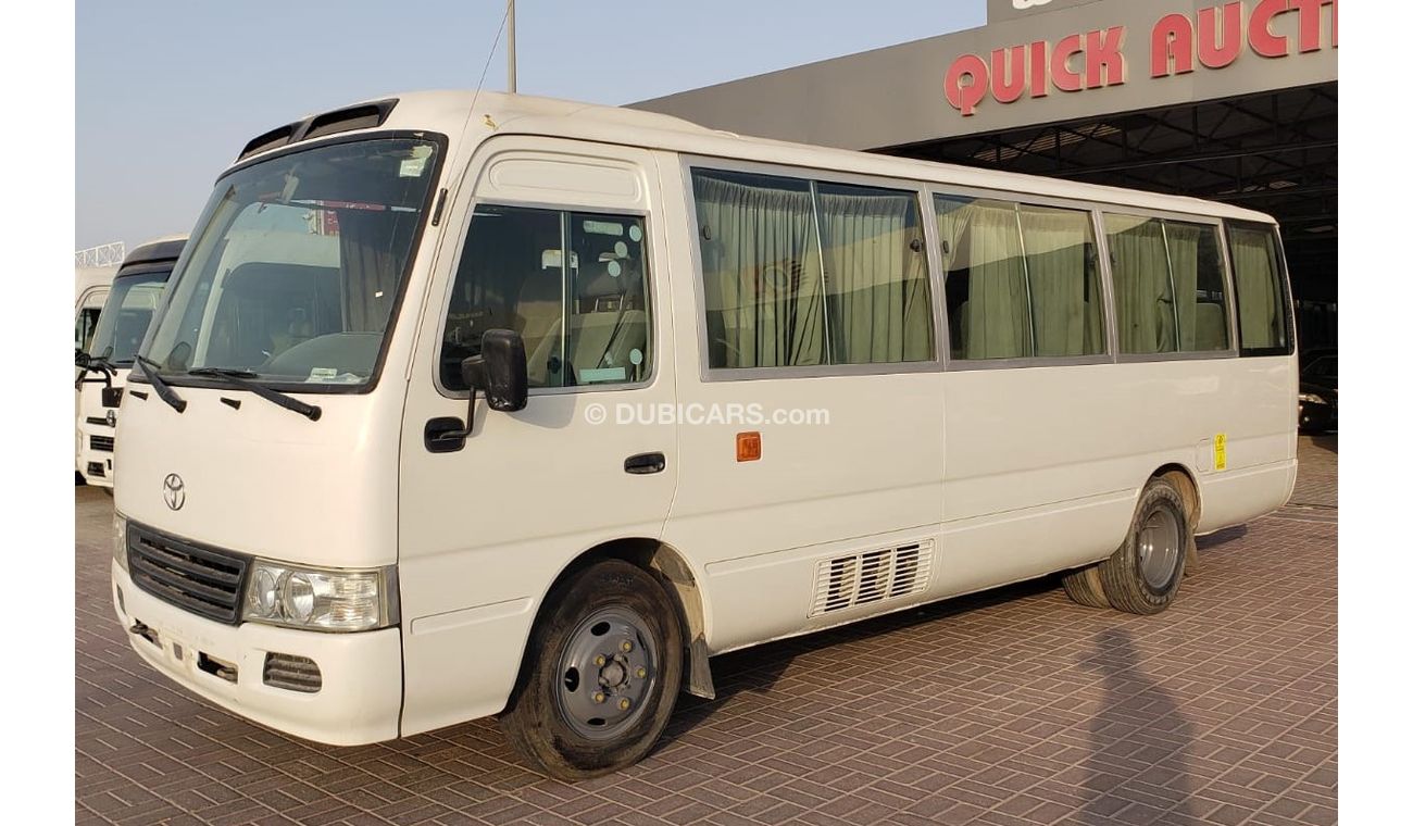 Toyota Coaster M/T 4.2L DIESEL WHITE 2012 (LOT# 53545)