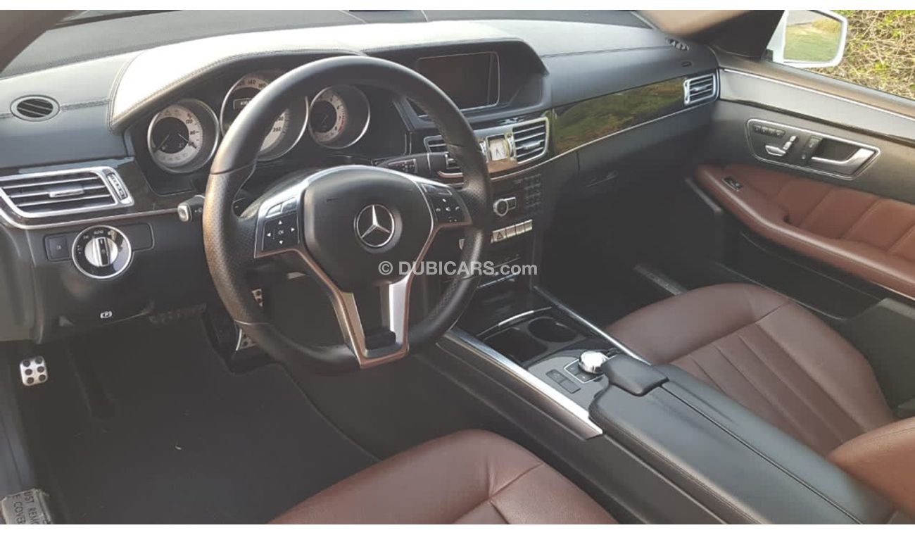 مرسيدس بنز E300 موديل 2014 خليجي فل مواصفات كراسي جلد ومثبت سرعه وتحكم كهربي كامل ونظام صوت ممتاز وكاميرا خلفيه ومدخ