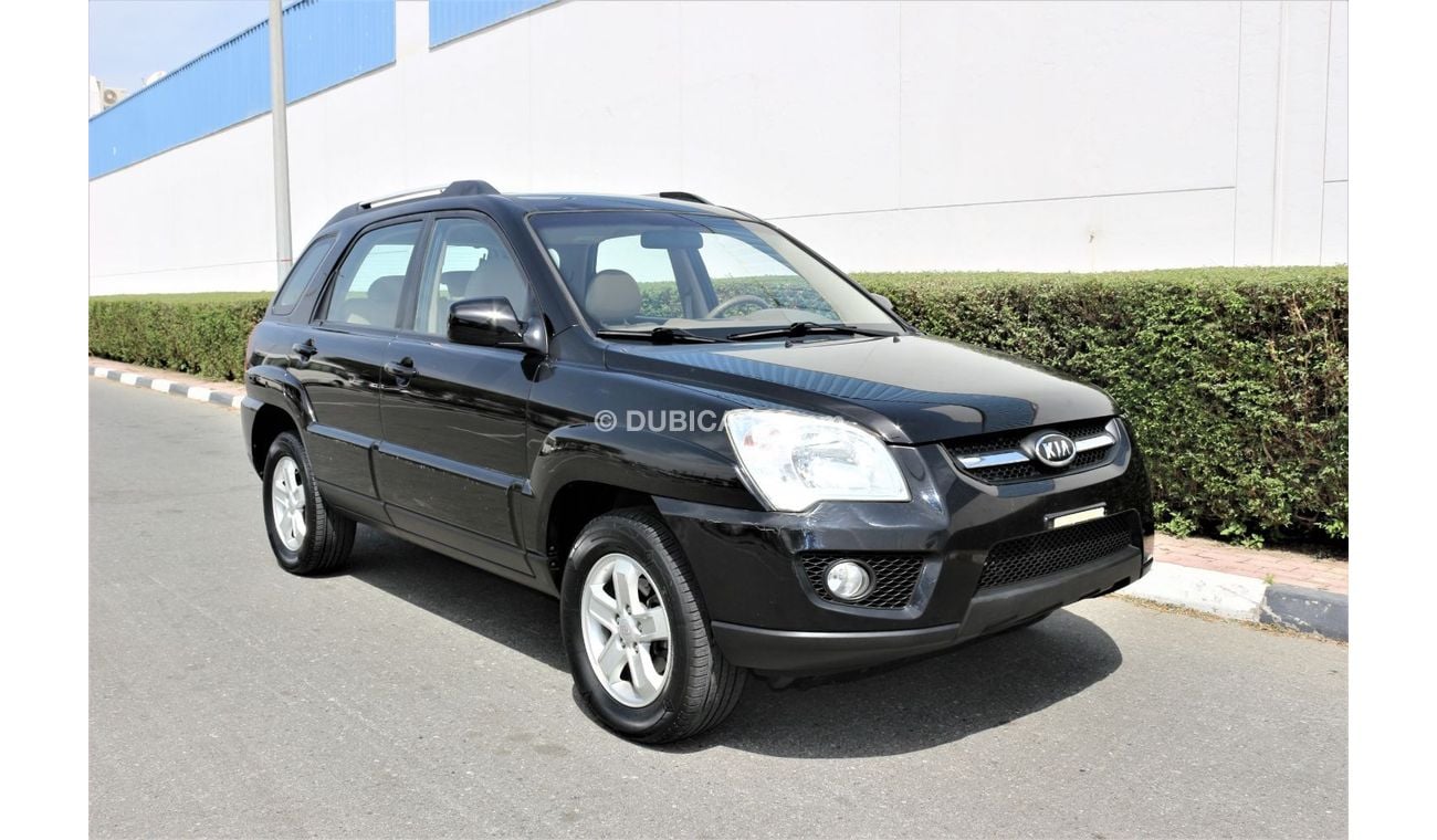 كيا سبورتيج كيا سبورتاج 2009 خليجي فل اوبشن جلد و فتحه فورويل 2700 سي سي