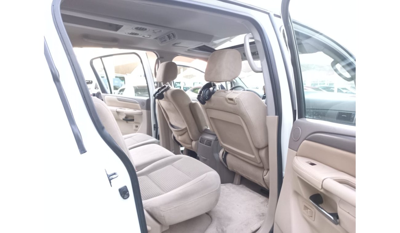 Nissan Armada Gulf model 2009  SE paint agency number one slot control unit in excellent condition