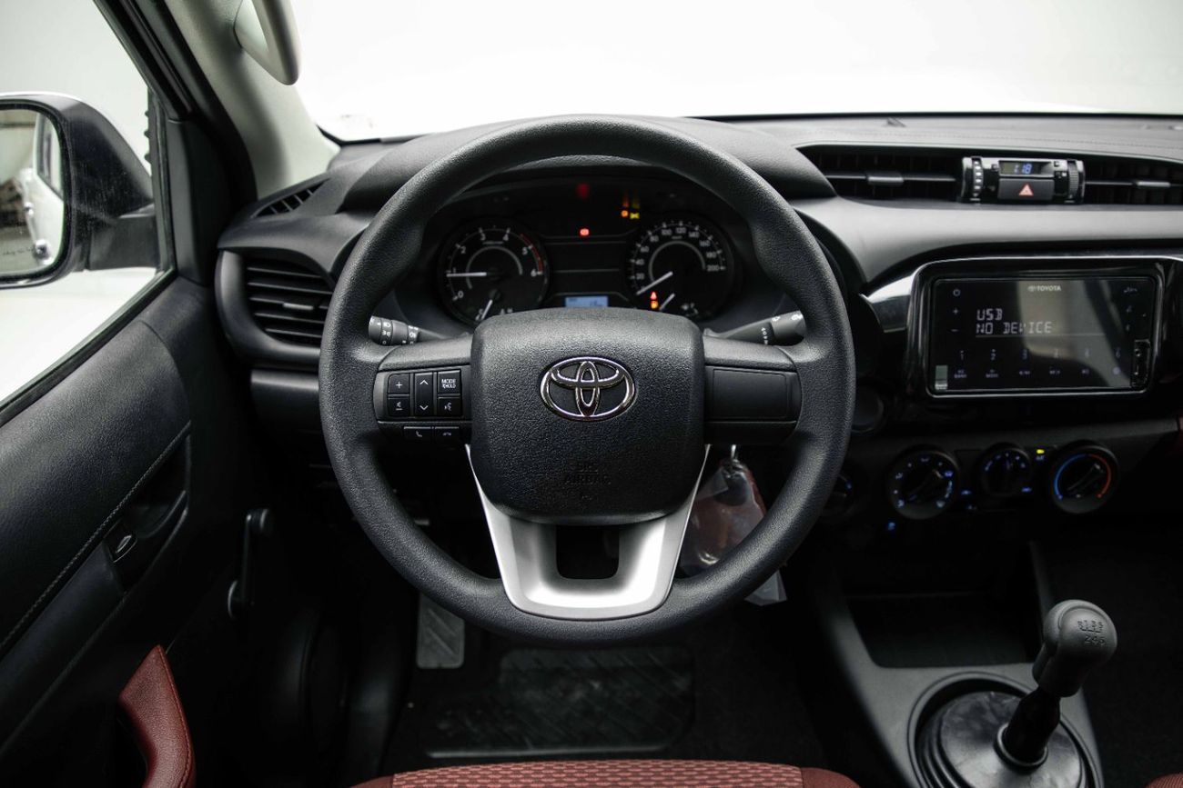 Toyota Hilux DLX 2.4L - Super White Inside Maroon | Export Only