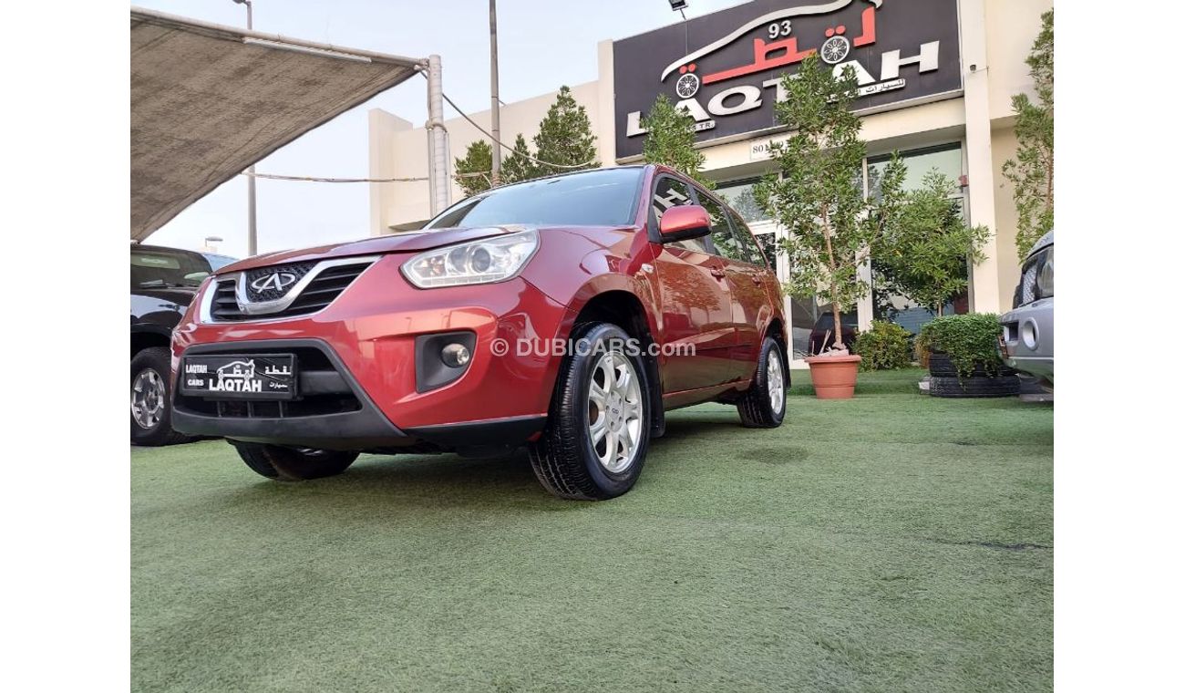 Chery Tiggo Model 2015 No. 1 red color inside beige leather hatch installed in excellent condition that does not