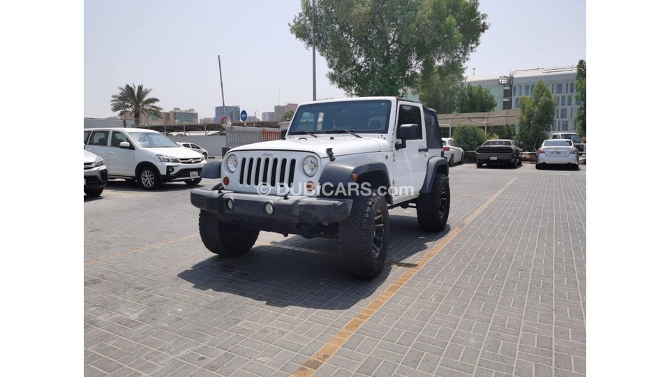 Jeep Wrangler Available in Dubai for sale AED 60,000. White, 2016