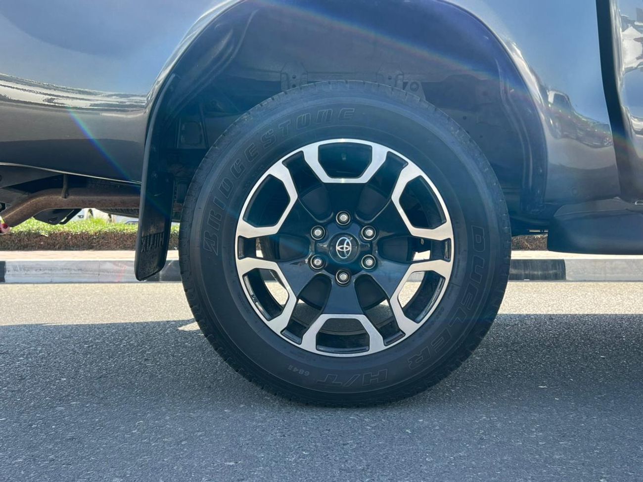 تويوتا هيلوكس The Toyota Hilux is a renowned mid-size pickup truck known for its exceptional ruggedness, reliabili