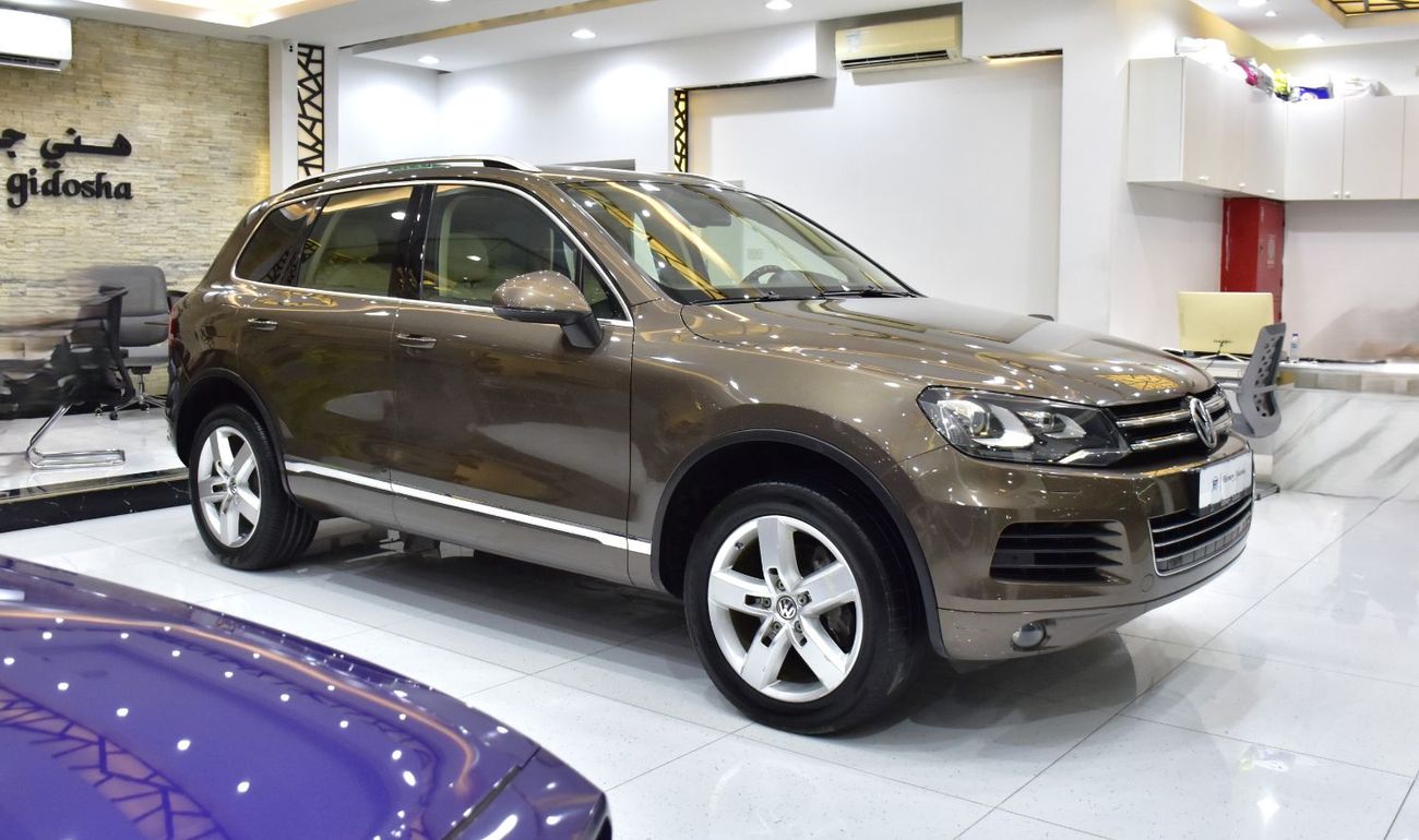 Volkswagen Touareg SEL EXCELLENT DEAL for our Volkswagen Touareg ( 2015 Model ) in Brown Color GCC Specs