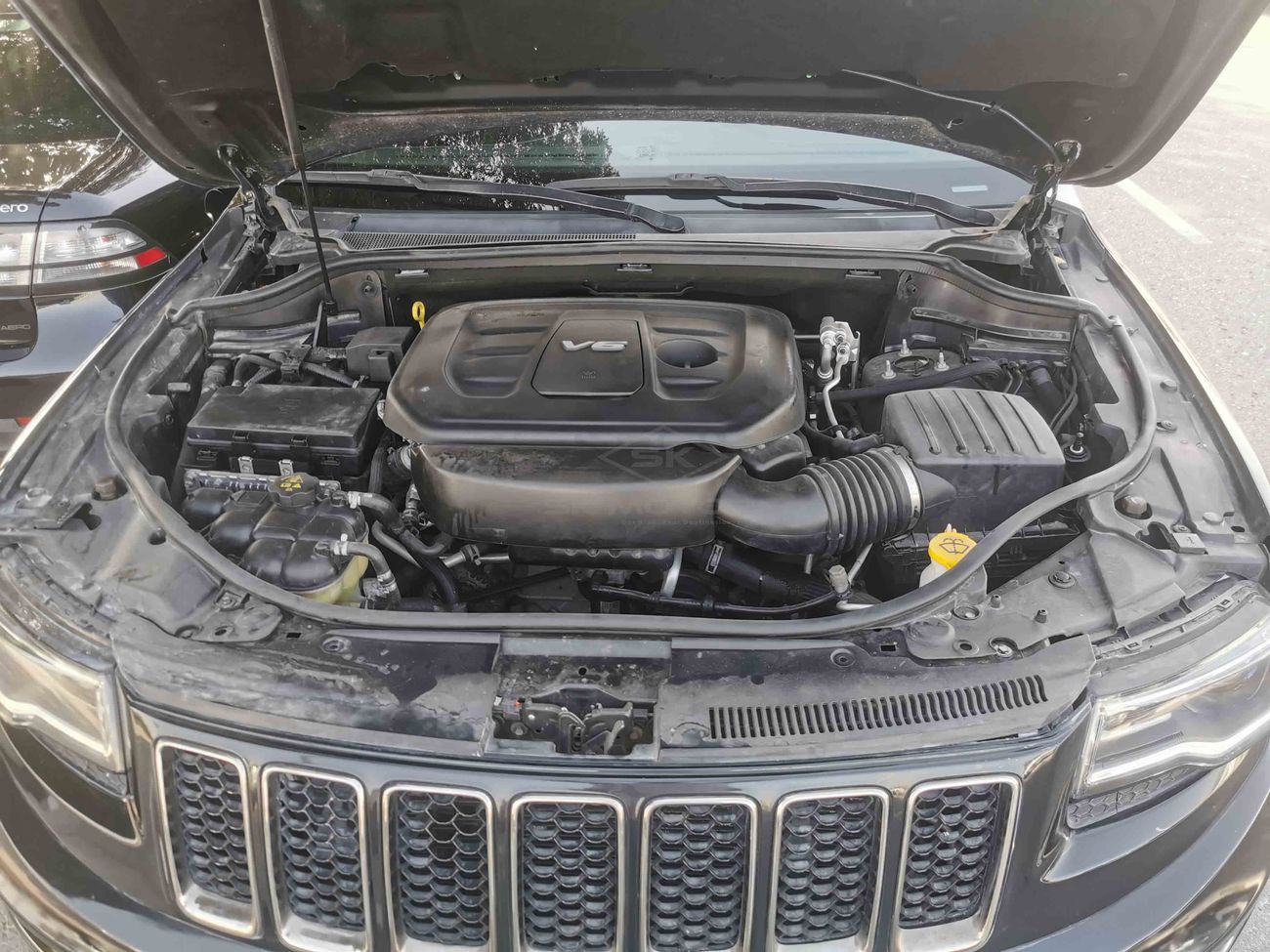 جيب جراند شيروكي 3.6L, 20" Rims, DRL LED Headlights, Parking Sensors, Driver Memory Seat, Heated Seats (LOT # 251)