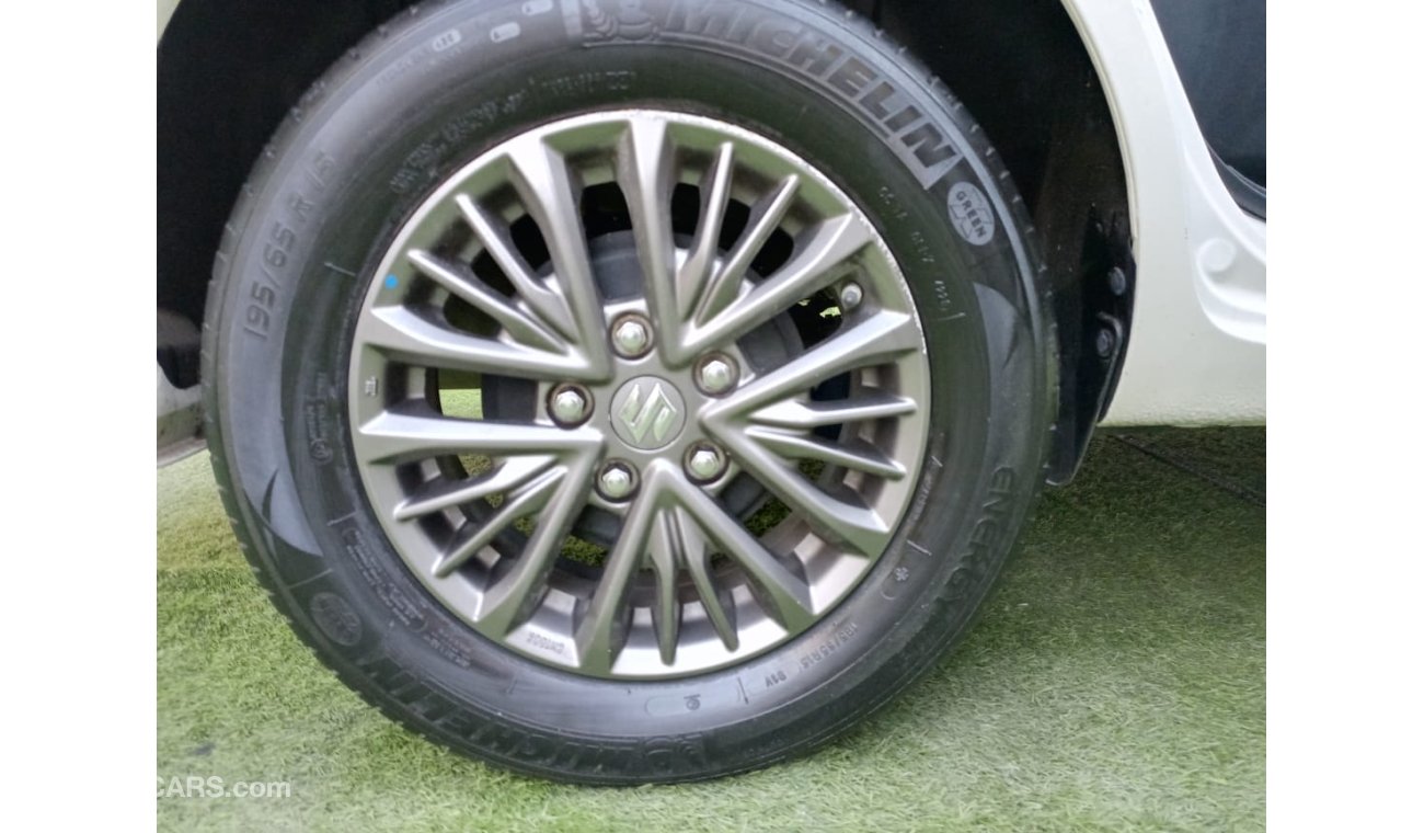 Suzuki Ertiga Gulf model 2019, agency dye, 1600 cc, imprint, white color, rear wing, alloy wheels, air conditionin