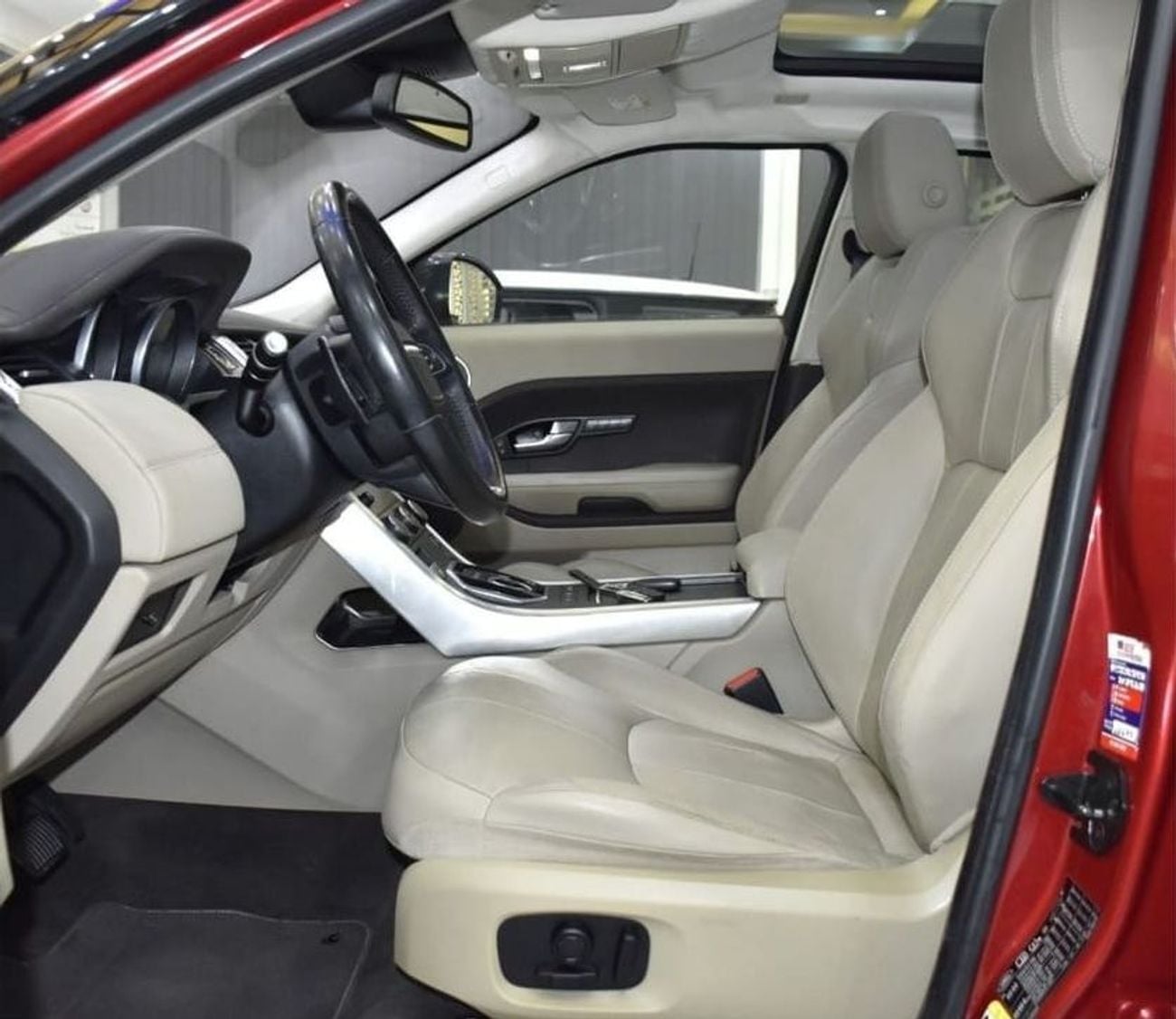 Land Rover Range Rover Evoque HSE EXCELLENT DEAL for our Land Rover Range Rover Evoque ( 2016 Model ) in Red Color GCC Specs