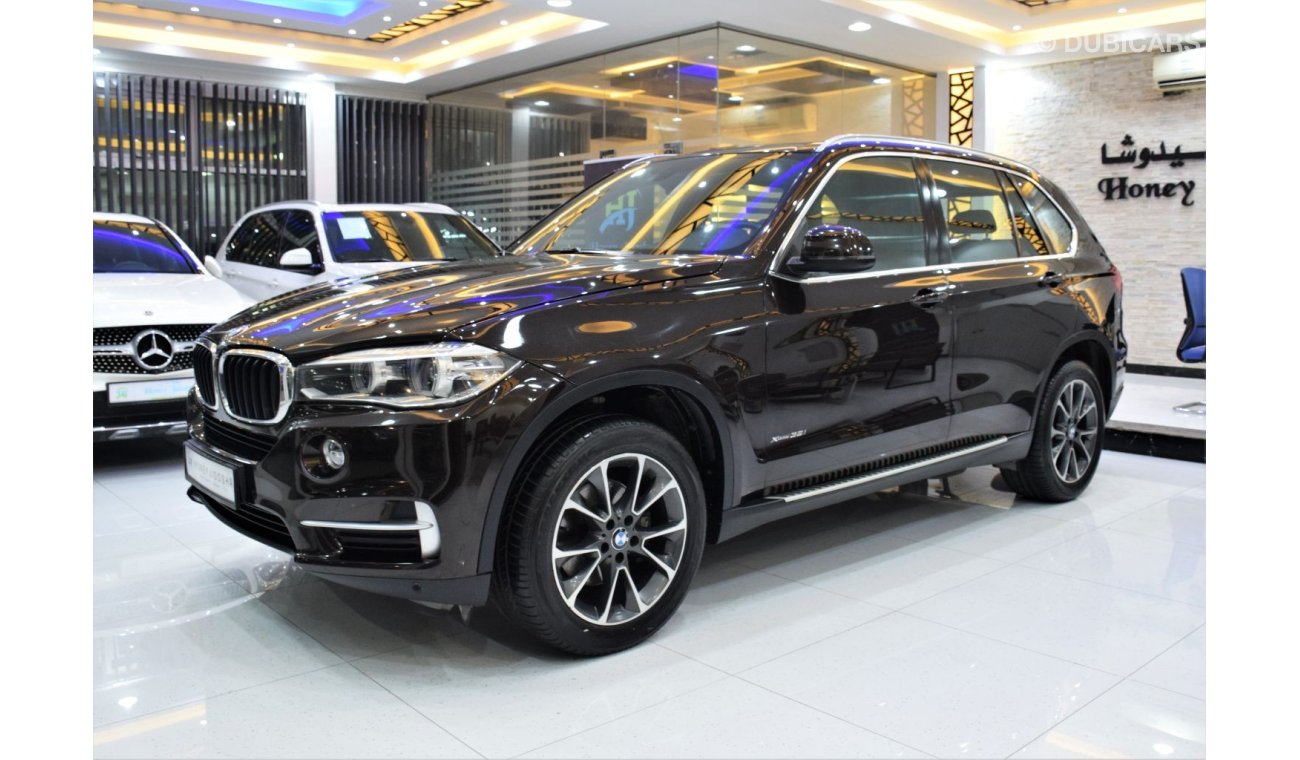 BMW X5 35i Exclusive EXCELLENT DEAL for our BMW X5 xDrive35i ( 2014 Model! ) in Brown Color! GCC Specs