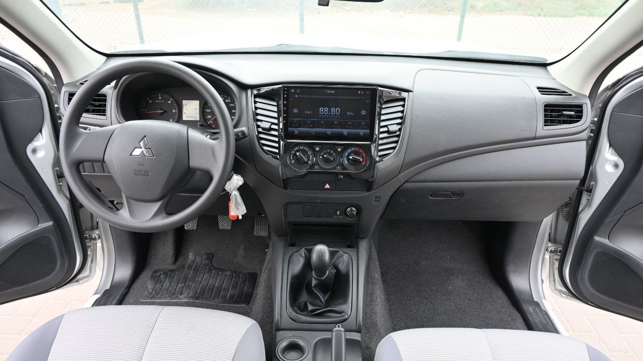 Mitsubishi L200 MITSUBISHI L-200 2.5L DIESEL DCAB 2WD GL 5/MT WHITE (with Touch Screen, Rear View Camera & Bedliner)