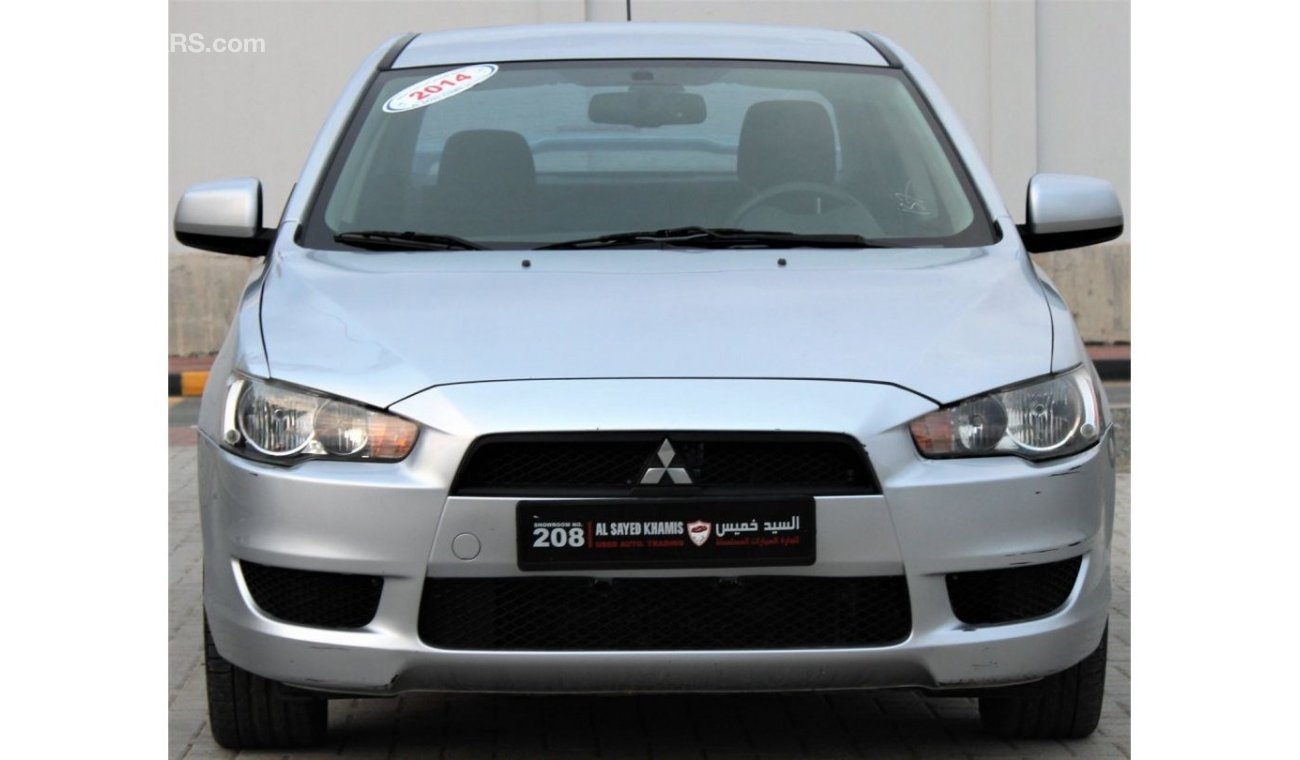 Mitsubishi Lancer Mitsubishi Lancer 2014 GCC, in excellent condition, without accidents, very clean from inside and ou