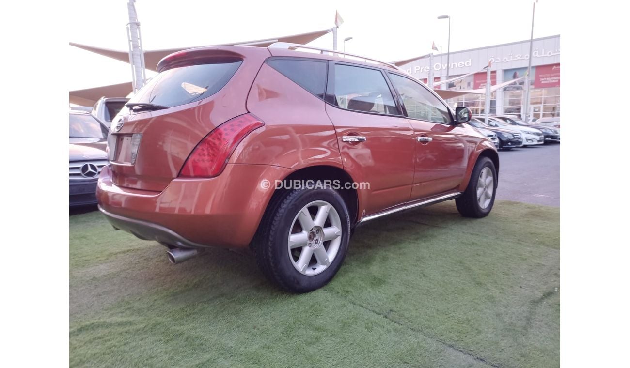 Nissan Murano Model 2008 Gulf Orange color number one Leather alloy wheels sensors in excellent condition, you do