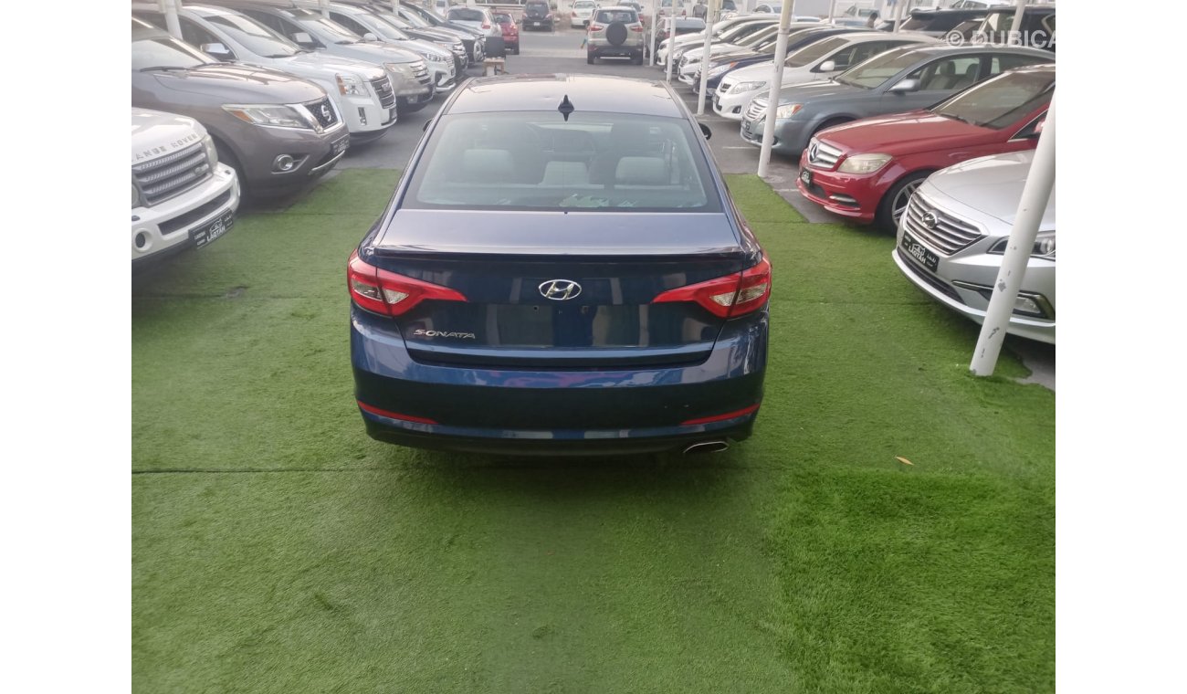 Hyundai Sonata 2015 model, cruise control, alloy wheels, air conditioning sensors, power fog lights, FM radio, in e