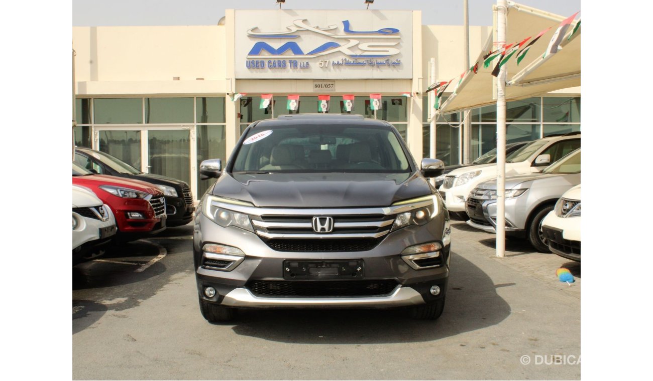 Honda Pilot Touring FULL OPTION  - GCC - EXCELLENT CONDITION INSIDE OUT - ACCIDENTS FREE