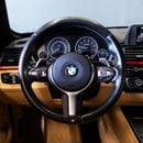 BMW 420i AED 2,208 0% Downpayment • 420i M-Sport Convertible • 1 Year Warranty