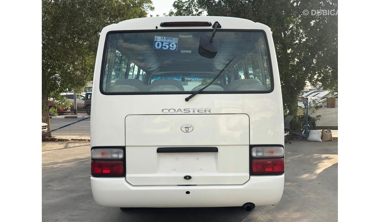 Toyota Coaster 4.2L DIESEL, Interior e Exterior Limpo, Especialmente para Angola, Grande Estoque Disponível.