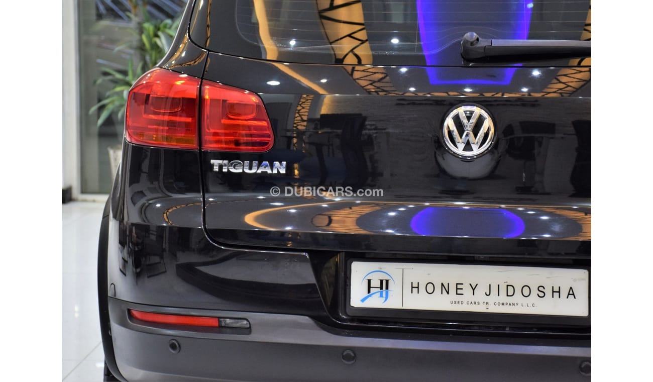 Volkswagen Tiguan SEL EXCELLENT DEAL for our Volkswagen Tiguan 2.0 TSi 4Motion ( 2014 Model! ) in Black Color! GCC Spe