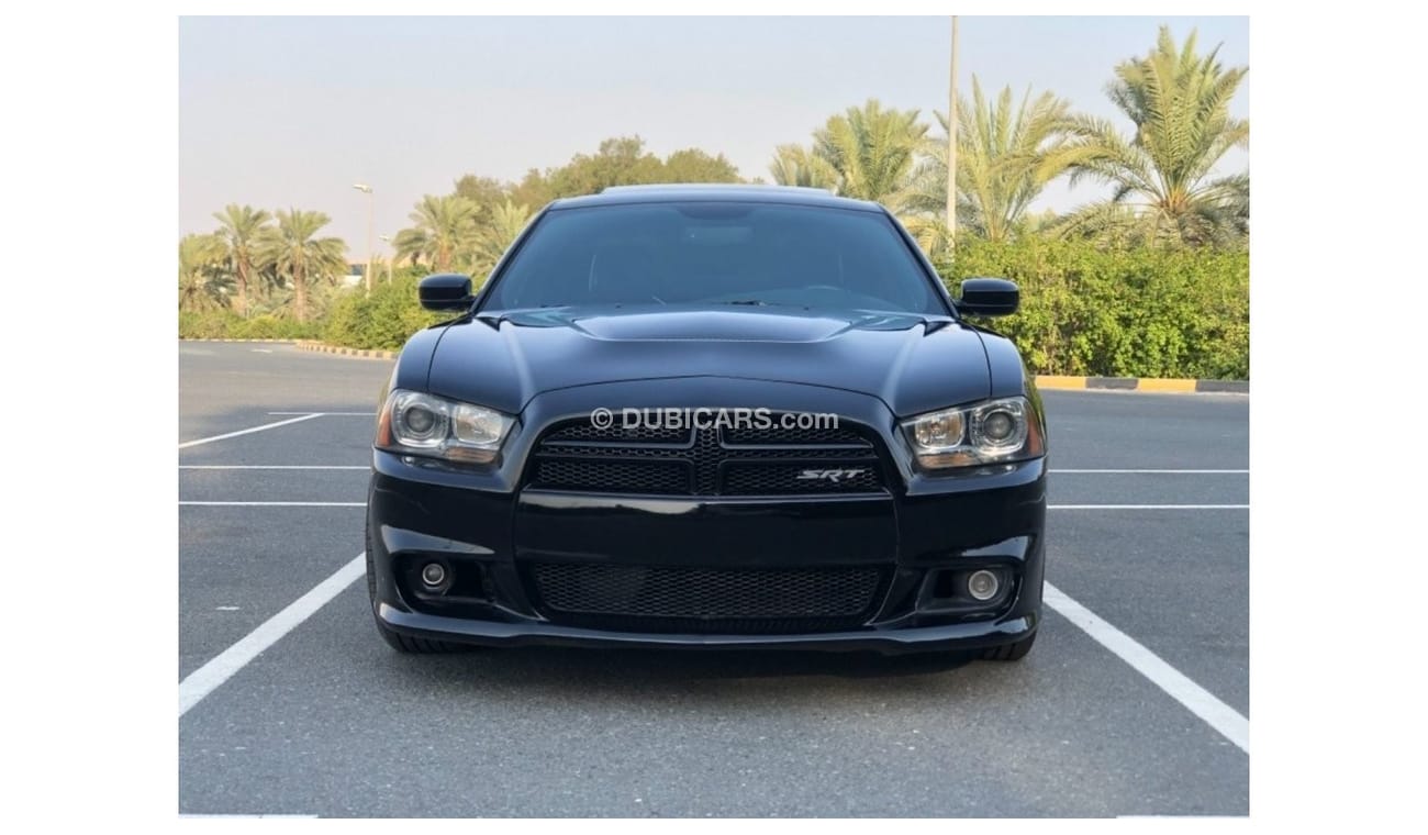 دودج تشارجر SRT8 موديل 2014 خليجي حاله ممتازه من الداخل والخارج فل مواصفات كراسي جلد ومثبت سرعه وتحكم كهربي كامل