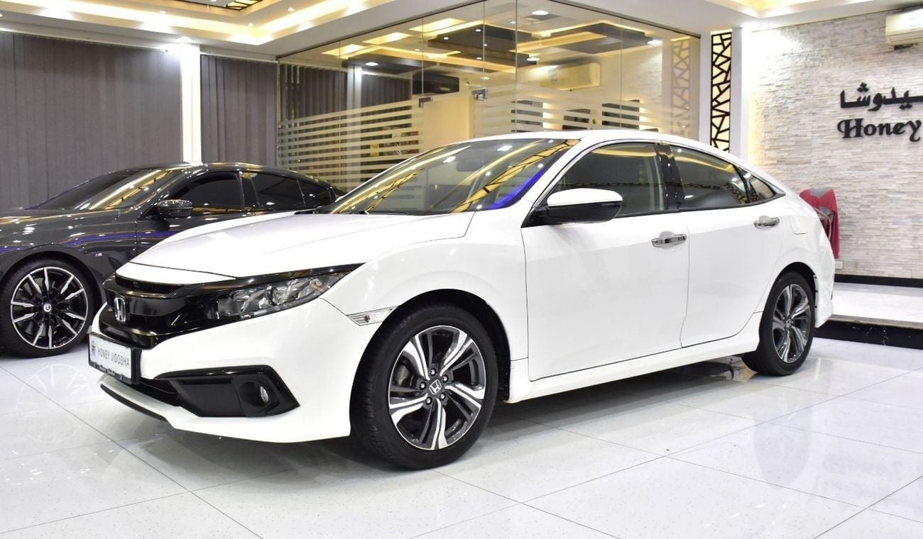 Honda Civic EXCELLENT DEAL for our Honda Civic ( 2021 Model ) in White Color GCC Specs