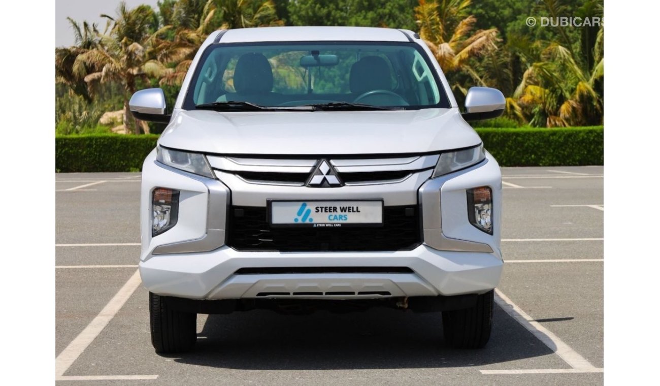 Mitsubishi L200 | 4x4 | Power Locks, Windows, Mirror | Petrol Engine | Excellent Condition | GCC