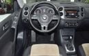 Volkswagen Tiguan SEL EXCELLENT DEAL for our Volkswagen Tiguan 2.0 TSi 4Motion ( 2014 Model ) in Red Color GCC Specs