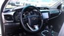 Toyota Hilux 2.4L diesel  . White 2025 model, M/T Wide body with Chrome bumper
