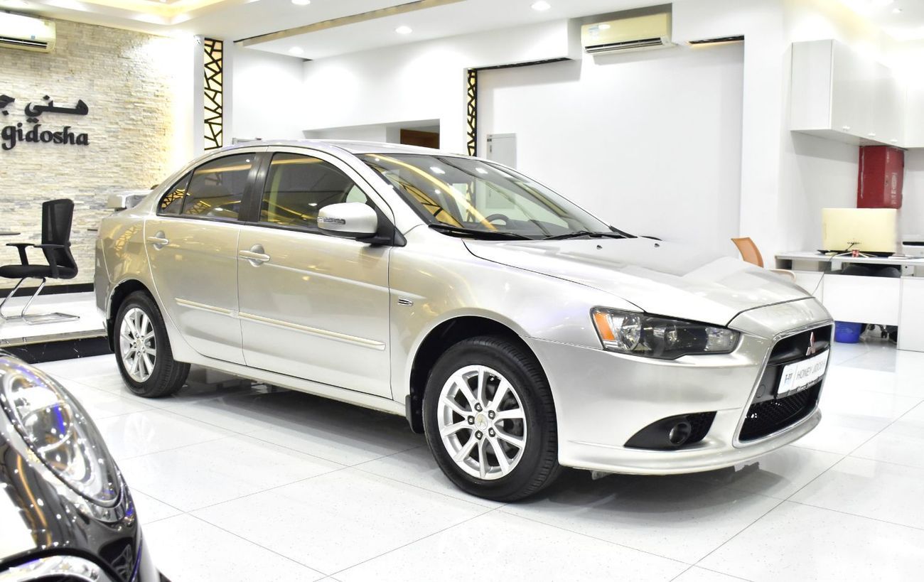Mitsubishi Lancer EX EXCELLENT DEAL for our Mitsubishi Lancer EX ( 2015 Model ) in Beige / Silver Color GCC Specs