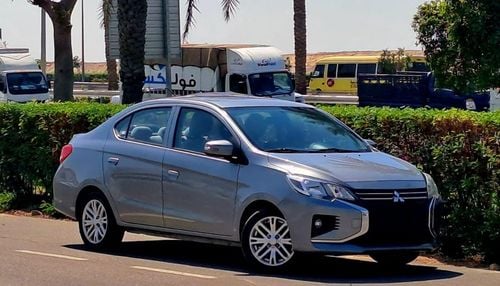 ميتسوبيشي اتراج GLX MID 370/- Monthly I GCC I Cruise, Camera, GPS I Accident Free