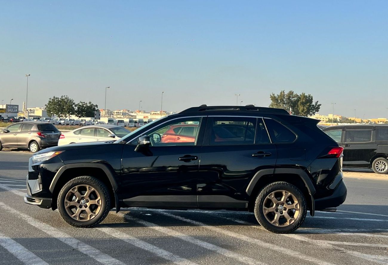 تويوتا راف ٤ 2023 Toyota RAV4 Hybrid Wood Land Edition 2.5L V4 - AWD 4x4 - Rear Camera - Leather Seats