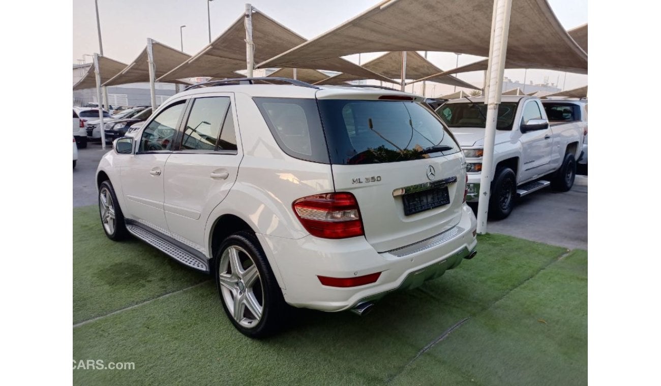 مرسيدس بنز ML 350 خليجي رقم واحد موديل 2009 لون ابيض فتحه جلد حساسات رنجات ومثبت سرعه وكاميرا خلفيه لاتحتاج الي مصاريف