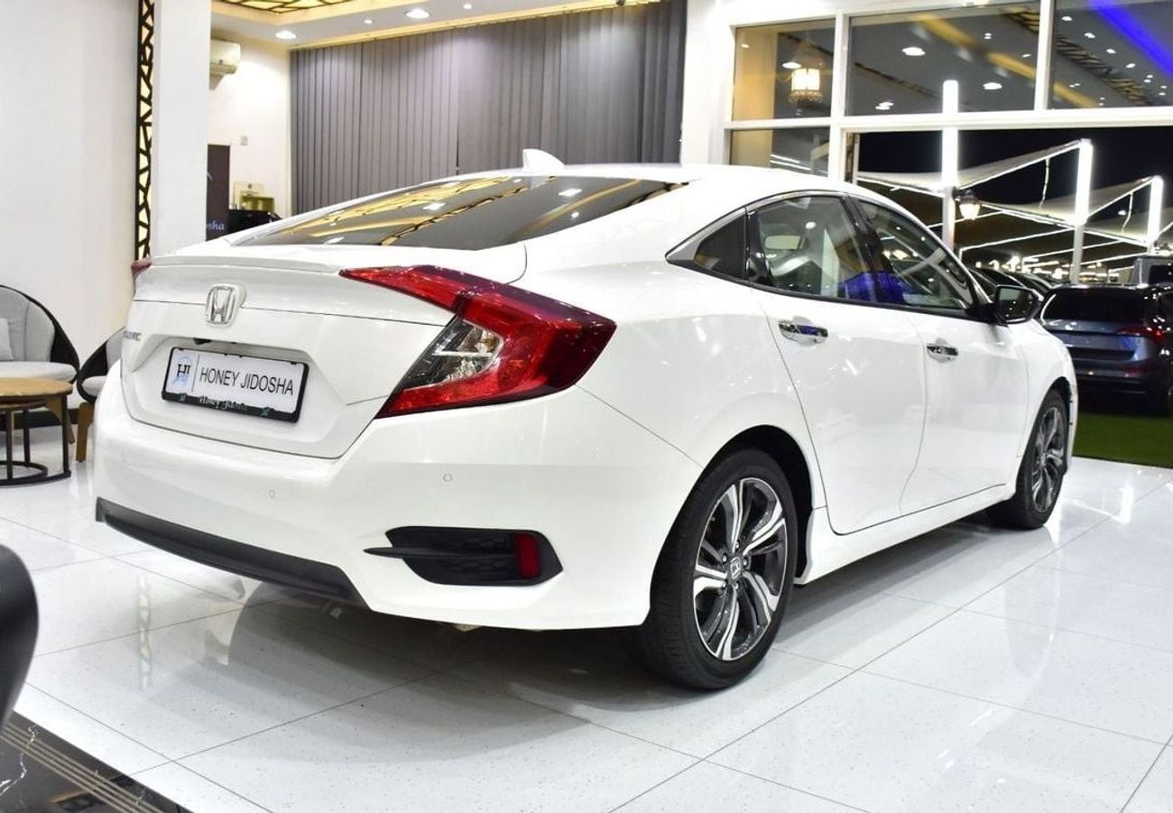 Honda Civic EXCELLENT DEAL for our Honda Civic ( 2021 Model ) in White Color GCC Specs