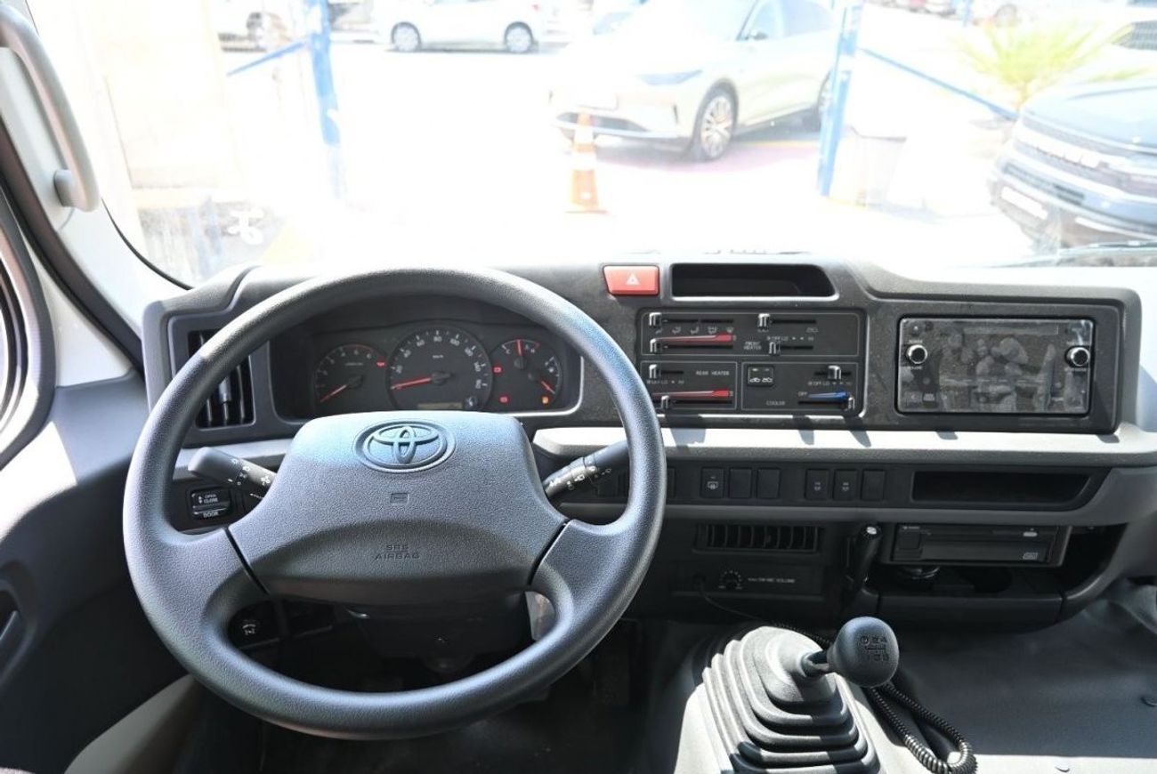 Toyota Coaster Toyota Coaster 4.2L Diesel, BUS, RWD, 2Doors Features: 23Seats, Manual Transmission, Auto Door Color