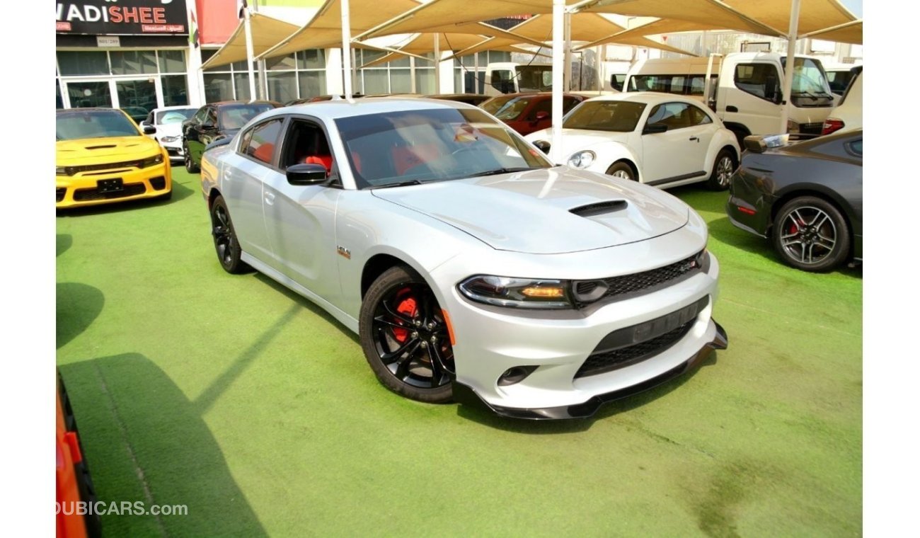 Dodge Charger R/T The Charger RT is powered by a 5.7-liter HEMI V8 engine that produces 370 horsepower and 535 Nm