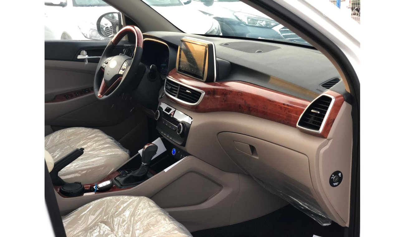 Hyundai Tucson 2.0L, WOOD INTERIOR, SPECIAL LED, DVD+ Rear Camera, 2-Pwr Seats, Alloy Rims 18'', خصيصا للسودان