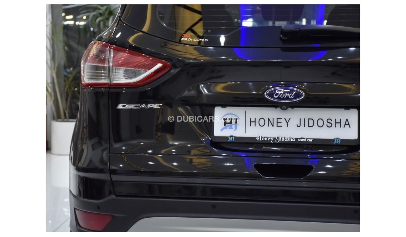 Ford Escape EXCELLENT DEAL for our Ford Escape SE Full Option ( 2014 Model ) in Black Color GCC Specs