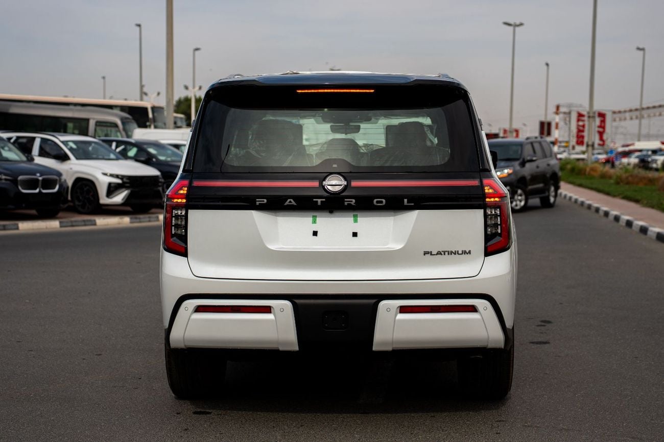 Nissan Patrol Nissan Patrol Platinum 2026 White roof black interior dark red and black