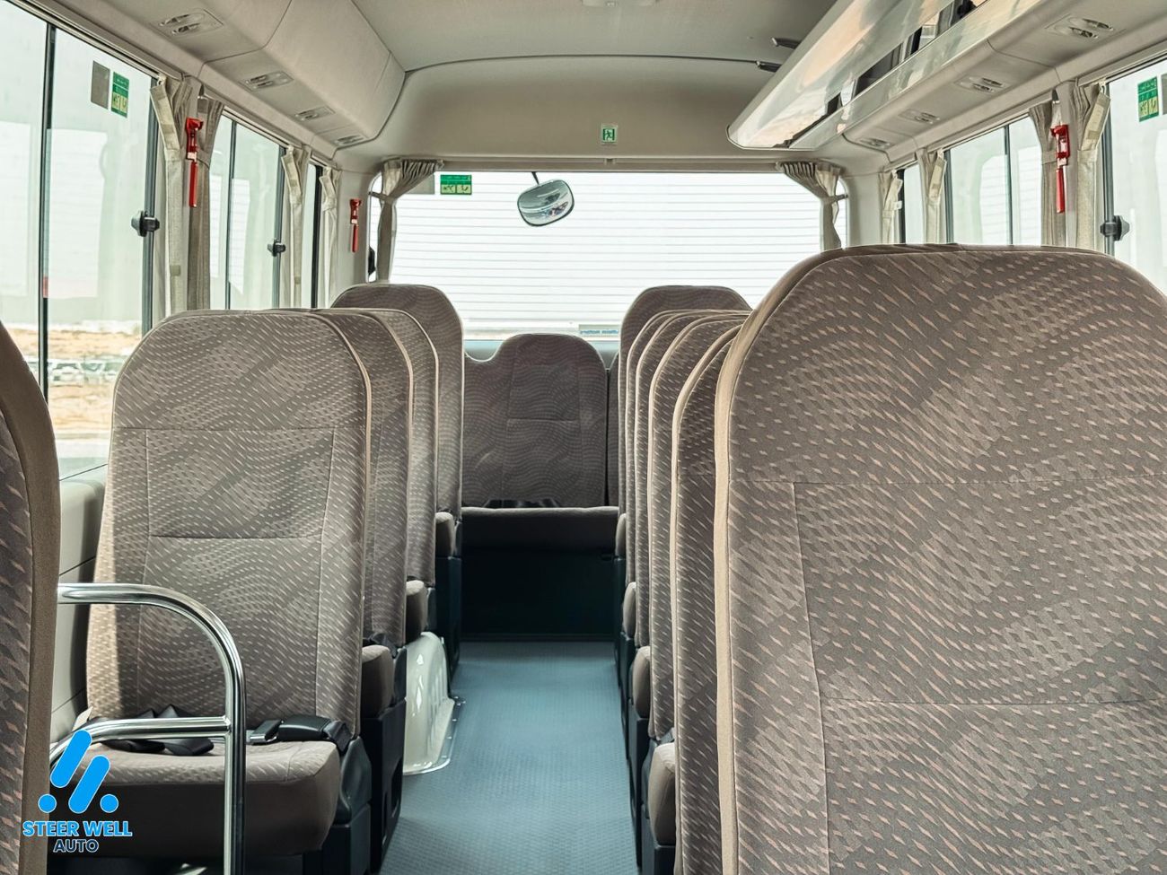 Toyota Coaster 23-Seater Bus 4.0L Diesel RWD GCC Specs Full Option White