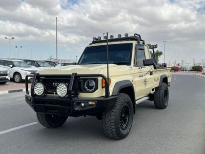 Toyota Land Cruiser Pick Up The Toyota Land Cruiser Pickup (LC79) is a legendary, rugged 4x4 workhorse known for extreme durabil
