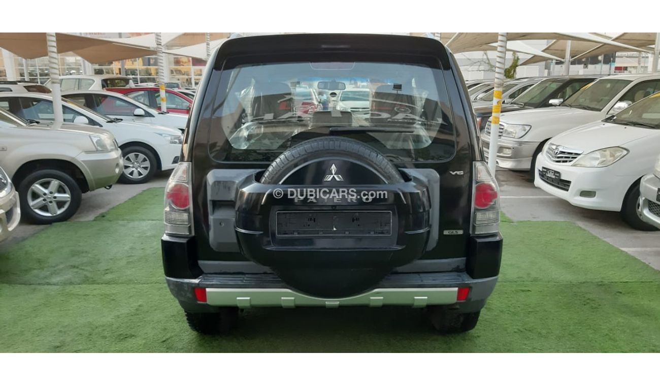 ميتسوبيشي باجيرو خليجى - مثبت سرعة - شاشة - رنجات بحالة ممتازة لاتحتاج لاى مصاريف