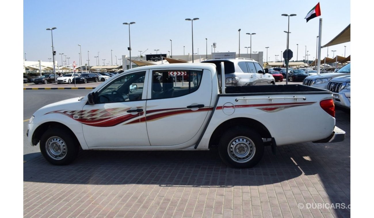 Mitsubishi L200 Std Mitsubishi L200 D/c Pick up 4x2 Diesel, Model:2012. Excellent condition