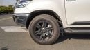تويوتا هيلوكس SR5 ECTAGR005 – 2026 Toyota Hilux Double Cab 2.7L Petrol Manual 4wd – White w Red