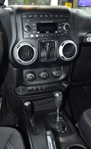 Jeep Wrangler EXCELLENT DEAL for our Jeep Wrangler Sahara ( 2014 Model ) in Red Color GCC Specs