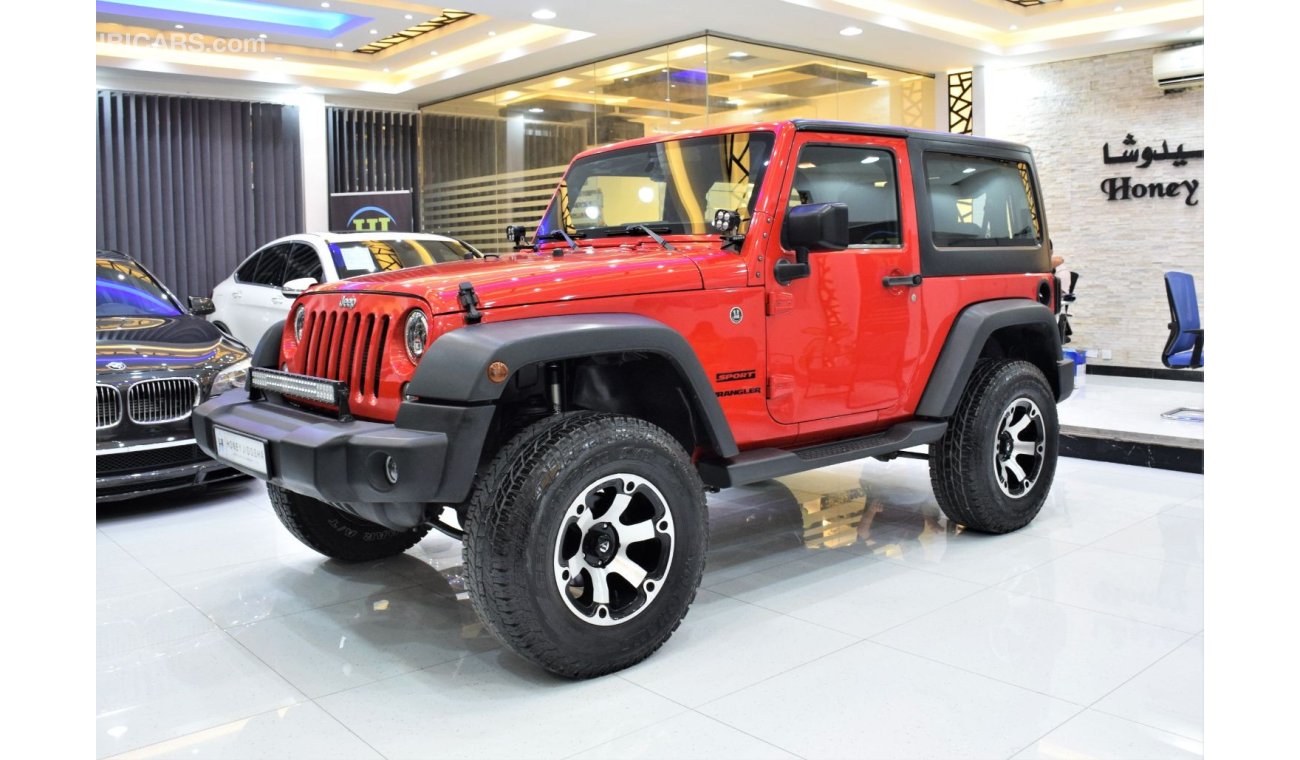 Jeep Wrangler Sport EXCELLENT DEAL for our Jeep Wrangler Sport ( 2015 Model! ) in Red Color! GCC Specs