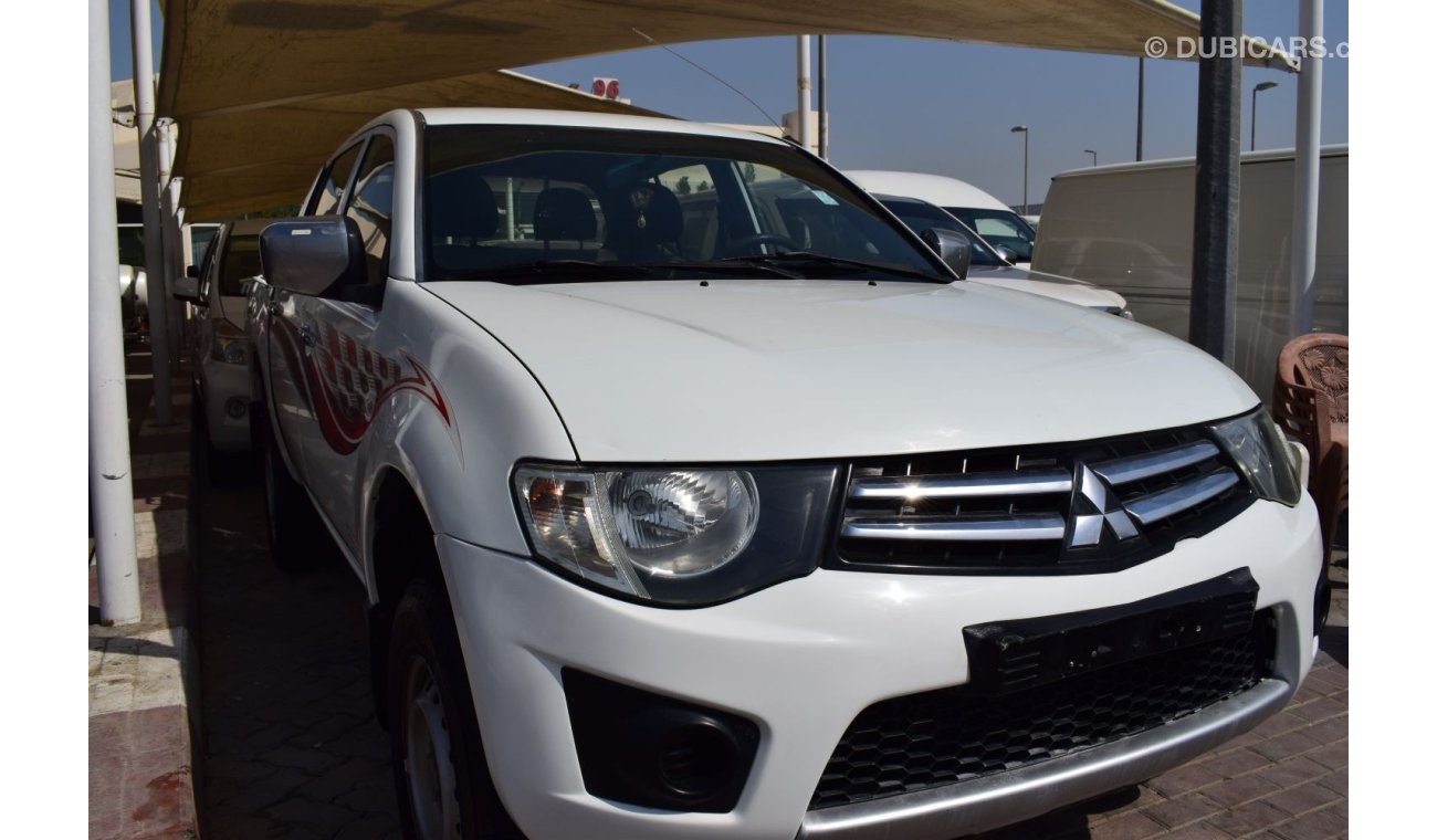 ميتسوبيشي L200 Mitsubishi L200 d/c pick up 4x4,model:2013.Excellent condition