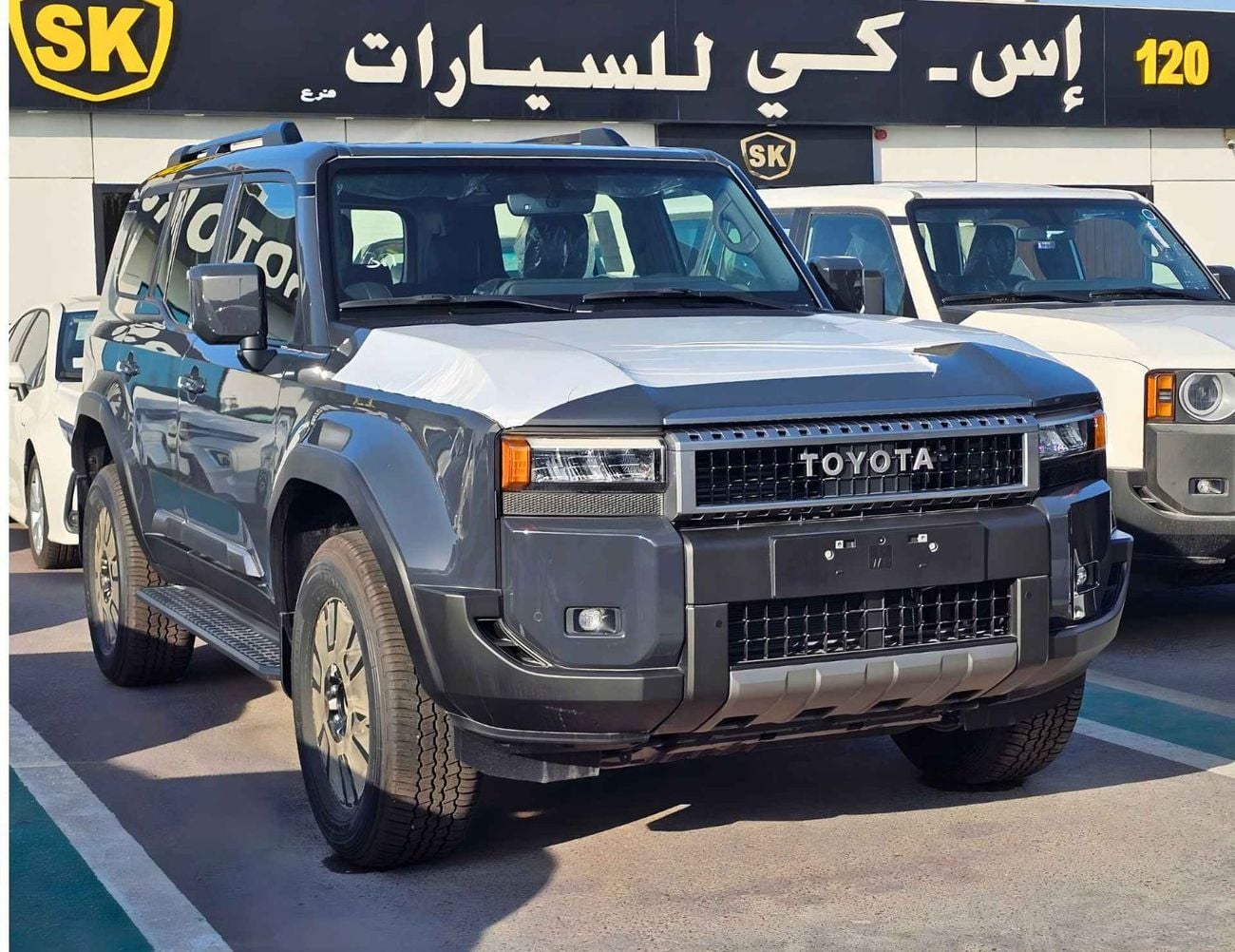 Toyota Prado ALL ROUNDER / 2.4L PETROL V4 / SUNROOF / DRIVER POWER SEAT / COOL BOX / MID OPTION (CODE # R2)