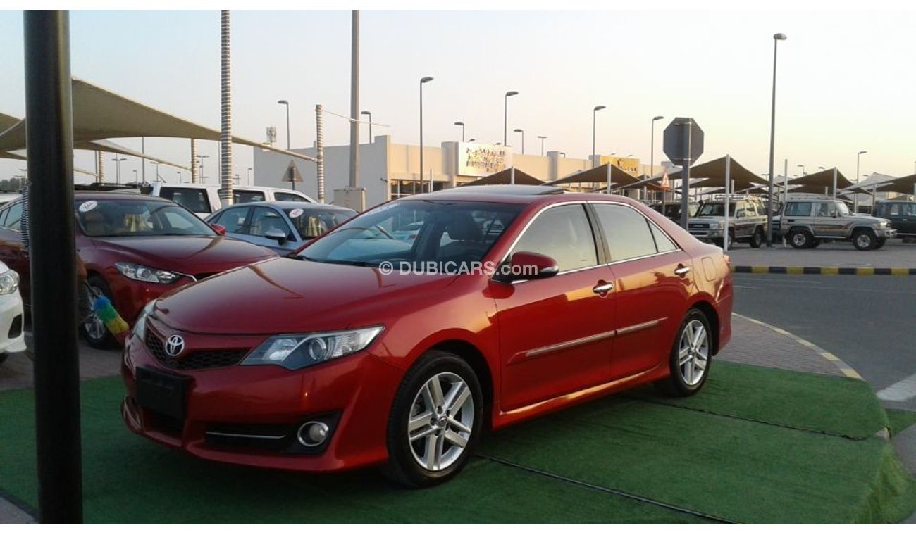 تويوتا كامري تويوتا كامرى عنابى خليجى 2013 فتحة سقف فول ابشن بحالة جيدة