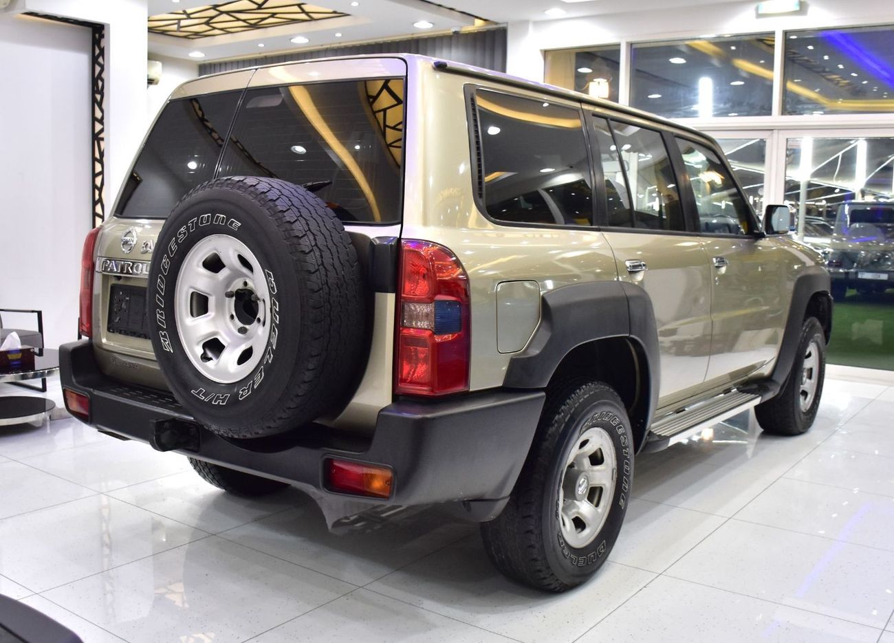 Nissan Patrol EXCELLENT DEAL for our Nissan Patrol GL 4x4 AT ( 2020 Model ) in Golden Color GCC Specs