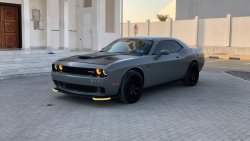 دودج تشالينجر Dodge Challenger RT with a hemi machine, a complete service on it, a cement color top clean, ready f